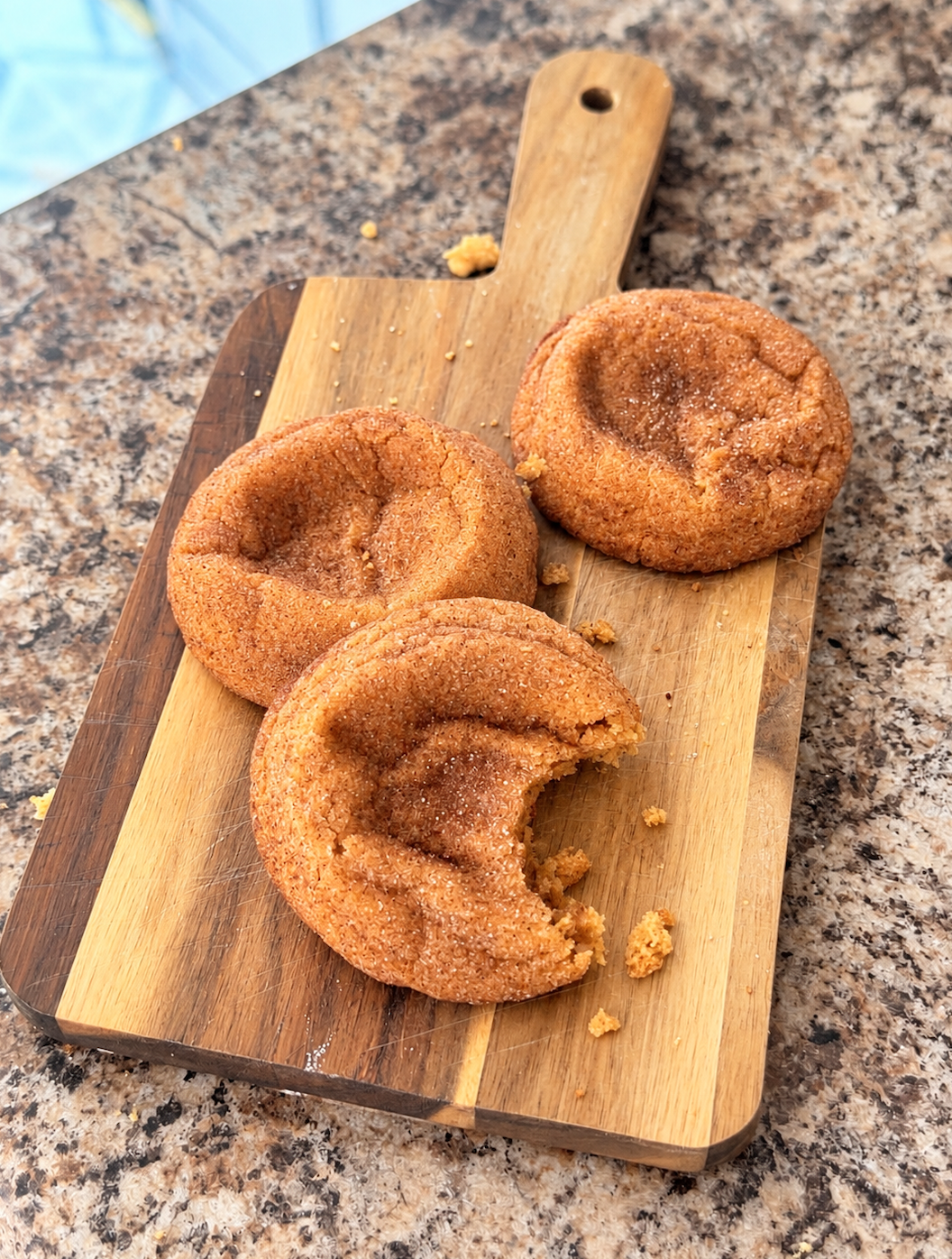 Soft and chewy pumpkin spice cookies coated in cinnamon sugar.